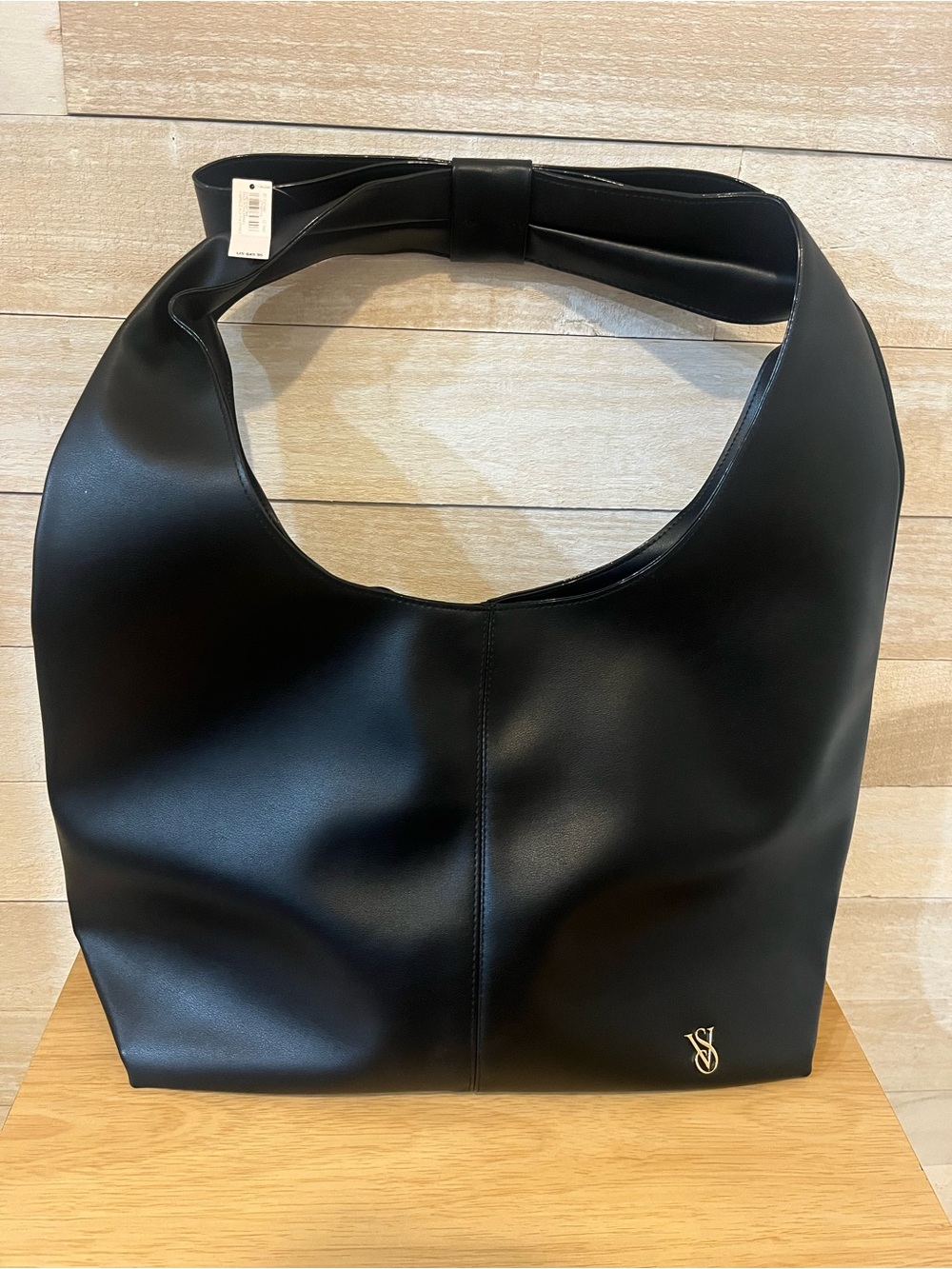 Victoria's Secret Black Leather Shoulder Hobo with Gold Logo Bow Strap